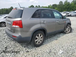 2013 Kia Sorento LX with VIN 5XYKT3A14DG386074, listed as a Copart auction lot 59879935 with 163,427 mi miles and Salvage title. Bid and sale history available at DreamBid. Image 3.