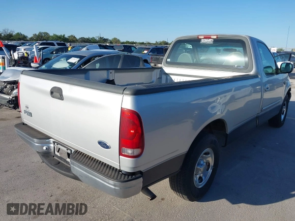 1999 Ford F-150 with VIN 1FTZF1727XKA60617, listed as a IAAI auction lot 41980403 with 98,481 mi miles and . Bid and sale history available at DreamBid. Image 4.