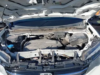 2017 Honda Pilot Touring with VIN 5FNYF6H93HB056387, listed as a IAAI auction lot 41095336 with 90,376 mi miles and . Bid and sale history available at DreamBid. Image 10.