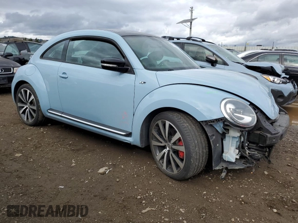 2014 Volkswagen Beetle Turbo R-Line with VIN 3VWVT7AT5EM635862, listed as a Copart auction lot 43500865 with 58,412 mi miles and Salvage Title. Bid and sale history available at DreamBid. Image 4.