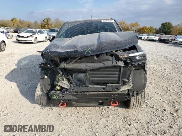 2024 Chevrolet Colorado 4WD Z71 with VIN 1GCPTDEK0R1112392, listed as a Copart auction lot 77392414 with 5,557 mi miles and Salvage Title. Bid and sale history available at carsss.com. Image 5.