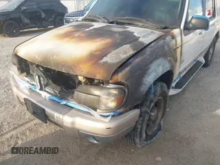 1998 Ford Explorer XLT z VIN 1FMZU32P9WZC01127, wystawiony jako IAAI lot #42310558 z przebiegiem Nie podano mil oraz . Historia ofert i sprzedaży dostępna na DreamBid. Obrazek 6.
