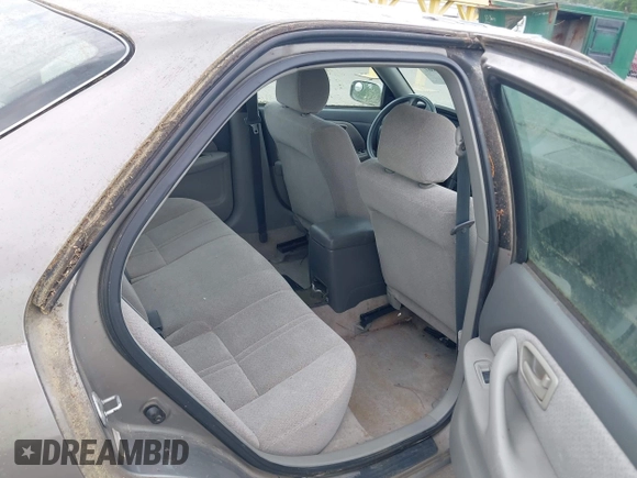 2001 Toyota Camry CE with VIN 4T1BG28K11U040227, listed as a IAAI auction lot 42220307 with 212,125 mi miles and . Bid and sale history available at DreamBid. Image 8.