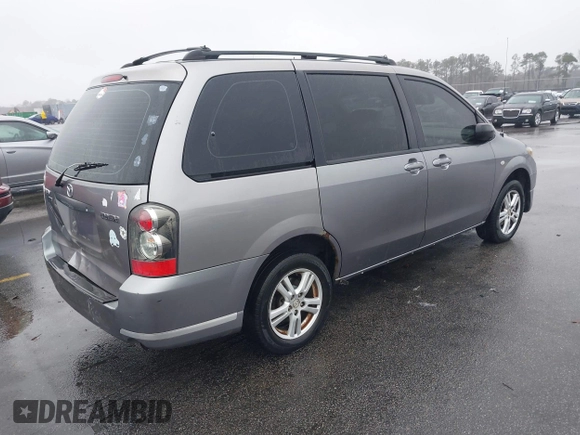 2005 Mazda MPV LX with VIN JM3LW28A050538622, listed as a IAAI auction lot 41555020 with 235,279 mi miles. Bid and sale history available at carsss.com. Image 4.