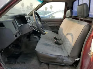 1989 Nissan Hardbody z VIN 1N6ND11S0KC342434, wystawiony jako Copart lot #71089274 z przebiegiem 300 076 mil mil oraz Szkody całkowita. Historia ofert i sprzedaży dostępna na DreamBid. Obrazek 7.