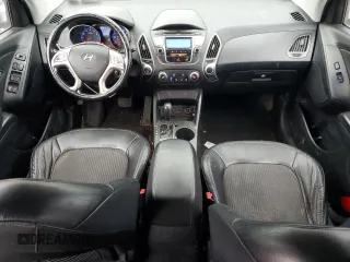 2010 Hyundai Tucson GLS with VIN KM8JU3AC2AU113747, listed as a Copart auction lot 48031375 with 220,982 mi miles and Salvage Title. Bid and sale history available at DreamBid. Image 8.
