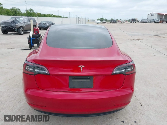 2023 Tesla Model 3 with VIN 5YJ3E1EA0PF455058, listed as a IAAI auction lot 42201618 with 31,147 mi miles and . Bid and sale history available at DreamBid. Image 15.