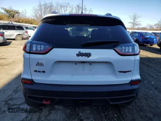 2019 Jeep Cherokee Trailhawk z VIN 1C4PJMBXXKD315140, wystawiony jako Copart lot #83298934 z przebiegiem 87 938 mil mil oraz Szkoda całkowita • Salvage title. Historia ofert i sprzedaży dostępna na DreamBid. Obrazek 6.