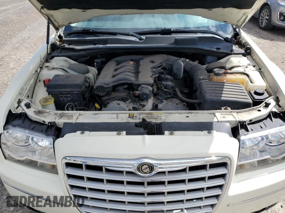 2010 Chrysler 300 Touring z VIN 2C3CA5CV1AH241629, wystawiony jako Copart lot #54841465 z przebiegiem 57 238 mil mil oraz Szkoda całkowita • Salvage title. Historia ofert i sprzedaży dostępna na DreamBid. Obrazek 11.