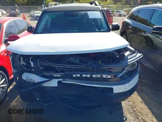 2023 Ford Bronco Sport Badlands z VIN 3FMCR9D93PRD33699, wystawiony jako IAAI lot #40632148 z przebiegiem 21 363 mil mil oraz . Historia ofert i sprzedaży dostępna na DreamBid. Obrazek 6.