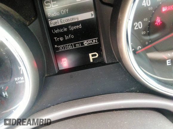 2012 Jeep Grand Cherokee Laredo with VIN 1C4RJEAGXCC157616, listed as a IAAI auction lot 42156539 with 301,661 mi miles. Bid and sale history available at carsss.com. Image 7.
