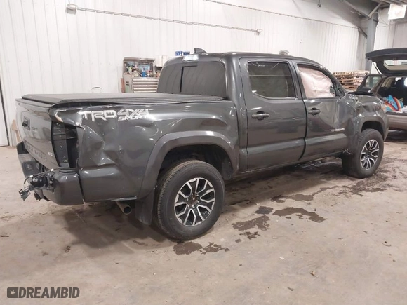 2020 Toyota Tacoma 4WD SR5 with VIN 3TMCZ5AN9LM355230, listed as a IAAI auction lot 41240351 with 122,164 mi miles. Bid and sale history available at carsss.com. Image 4.