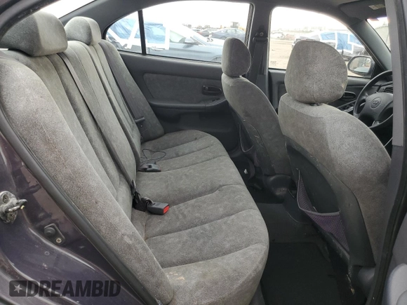 2003 Hyundai Elantra GLS z VIN KMHDN45D63U594320, wystawiony jako Copart lot #58742565 z przebiegiem 163 772 mil mil oraz Szkoda całkowita • Salvage title. Historia ofert i sprzedaży dostępna na DreamBid. Obrazek 10.