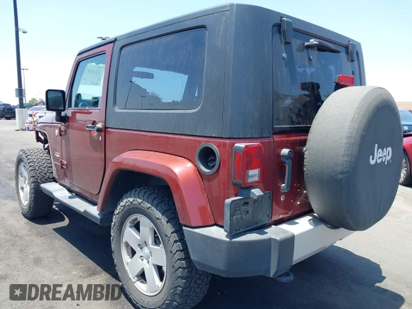 2010 Jeep Wrangler Sahara z VIN 1J4AA5D14AL125062, wystawiony jako IAAI lot #42418736 z przebiegiem 90 839 mil mil oraz . Historia ofert i sprzedaży dostępna na DreamBid. Obrazek 3.