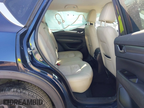 2017 Mazda CX-5 Touring with VIN JM3KFACL1H0192549, listed as a IAAI auction lot 41667781 with 89,030 mi miles. Bid and sale history available at carsss.com. Image 8.