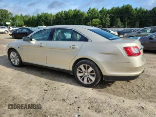 2010 Ford Taurus Limited with VIN 1FAHP2FW7AG138753, listed as a Copart auction lot 64880025 with 242,728 mi miles and Clean title. Bid and sale history available at DreamBid. Image 2.