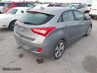 2014 Hyundai Elantra GT with VIN KMHD35LH0EU234187, listed as a IAAI auction lot 42031965 with 1 mi miles. Bid and sale history available at carsss.com. Image 4.