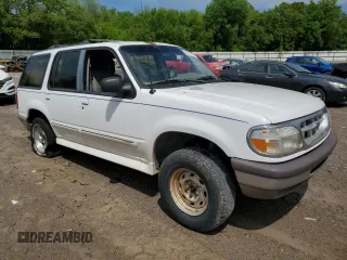 1996 Ford Explorer XL z VIN 1FMDU34X7TUD53066, wystawiony jako Copart lot #52031465 z przebiegiem 142 895 mil mil oraz Szkoda całkowita • Salvage title. Historia ofert i sprzedaży dostępna na DreamBid. Obrazek 4.