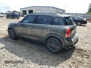 2014 MINI Countryman S with VIN WMWZC3C57EWP25099, listed as a Copart auction lot 62646555 with 153,059 mi miles and Salvage title. Bid and sale history available at DreamBid. Image 2.