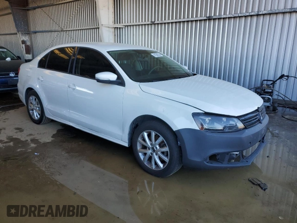 2012 Volkswagen Jetta SE with VIN 3VWDP7AJ0CM316610, listed as a Copart auction lot 81082534 with 117,677 mi miles and Salvage title. Bid and sale history available at DreamBid. Image 4.