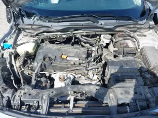 2016 Honda Civic Sedan EX with VIN 2HGFC2F74GH563268, listed as a IAAI auction lot 41805038 with 125,577 mi miles. Bid and sale history available at carsss.com. Image 10.