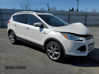 2016 Ford Escape Titanium with VIN 1FMCU0J99GUB83458, listed as a Copart auction lot 48828195 with 74,250 mi miles and Salvage Title. Bid and sale history available at carsss.com. Image 4.