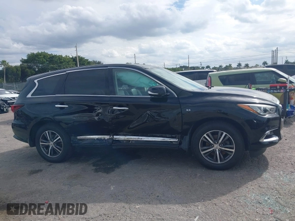 2019 Infiniti QX60 LUXE with VIN 5N1DL0MN0KC549578, listed as a IAAI auction lot 41362311 with 162,457 mi miles. Bid and sale history available at carsss.com. Image 13.