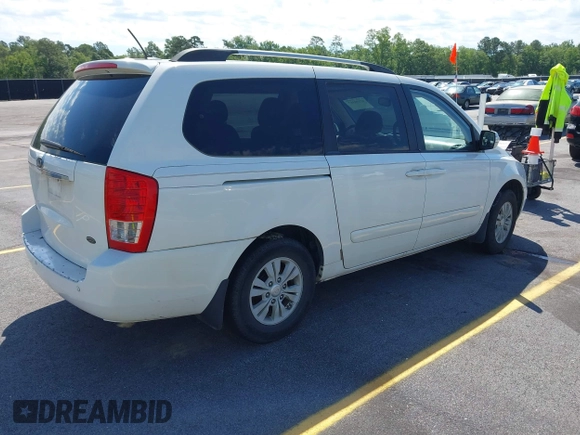 2012 Kia Sedona LX with VIN KNDMG4C71C6447550, listed as a IAAI auction lot 42190357 with 161,960 mi miles. Bid and sale history available at carsss.com. Image 4.