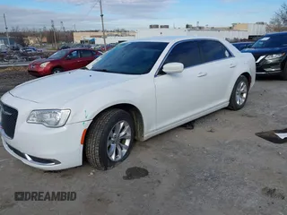 2015 Chrysler 300 Limited with VIN 2C3CCAAG8FH781252, listed as a IAAI auction lot 41138887 with 115,116 mi miles. Bid and sale history available at carsss.com. Image 2.