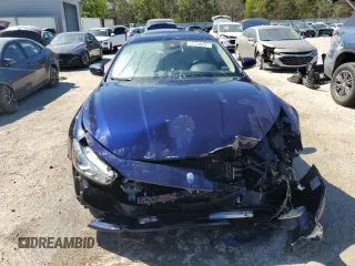 2017 Maserati Ghibli с VIN ZAM57XSA5H1242414, выставлен на аукционе Copart как лот 49957545 с пробегом 88 288 миль миль и Чистый • Clean title. История ставок и продаж доступна на DreamBid. Изображение 5.