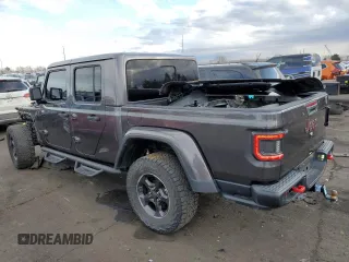2021 Jeep Gladiator Rubicon with VIN 1C6JJTBG4ML504141, listed as a Copart auction lot 43367565 with 56,879 mi miles and Salvage title. Bid and sale history available at DreamBid. Image 2.