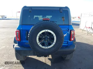 2022 Ford Bronco z VIN 1FMEE5DPXNLB37346, wystawiony jako IAAI lot #41346731 z przebiegiem 20 709 mil mil oraz . Historia ofert i sprzedaży dostępna na DreamBid. Obrazek 17.