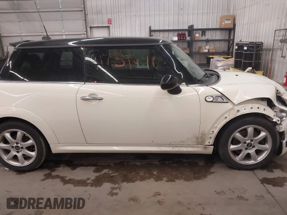 2010 MINI Hardtop S with VIN WMWMF7C50ATZ71884, listed as a IAAI auction lot 41731490 with 55,864 mi miles and . Bid and sale history available at DreamBid. Image 14.