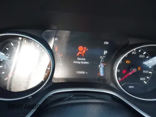 2018 Jeep Compass Altitude with VIN 3C4NJDBBXJT202826, listed as a IAAI auction lot 42012645 with 125,839 mi miles and . Bid and sale history available at carsss.com. Image 7.