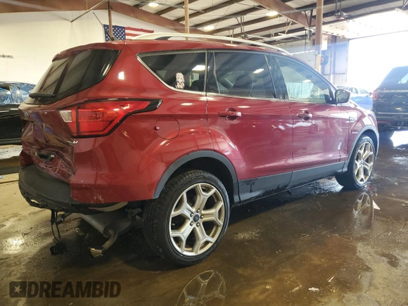 2019 Ford Escape Titanium with VIN 1FMCU9J98KUB93072, listed as a Copart auction lot 61931205 with 64,412 mi miles and Salvage title. Bid and sale history available at DreamBid. Image 3.