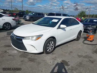 2016 Toyota Camry XLE with VIN 4T1BF1FKXGU580295, listed as a IAAI auction lot 40877913 with 65,660 mi miles. Bid and sale history available at carsss.com. Image 17.