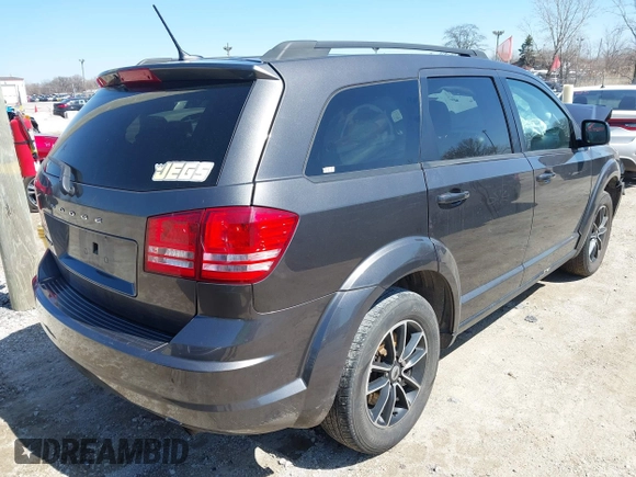 2018 Dodge Journey SE with VIN 3C4PDCAB5JT195635, listed as a IAAI auction lot 41987188 with 133,598 mi miles and . Bid and sale history available at DreamBid. Image 4.