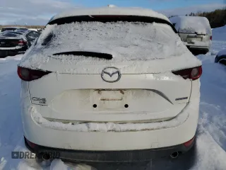 2020 Mazda CX-5 Touring z VIN JM3KFBCM4L0809644, wystawiony jako Copart lot #45048825 z przebiegiem 129 178 mil mil oraz Szkoda całkowita • Salvage title. Historia ofert i sprzedaży dostępna na DreamBid. Obrazek 6.