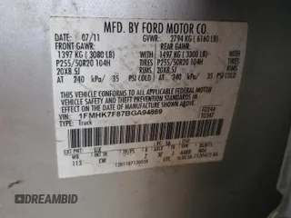 2011 Ford Explorer Limited z VIN 1FMHK7F87BGA94869, wystawiony jako Copart lot #61960435 z przebiegiem 209 989 mil mil oraz Szkoda całkowita • Salvage title. Historia ofert i sprzedaży dostępna na DreamBid. Obrazek 13.