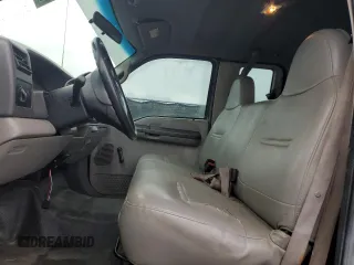 2000 Ford F-250 XL with VIN 1FTNX21F3YED35736, listed as a Copart auction lot 50309805 with 303,811 mi miles and Salvage title. Bid and sale history available at DreamBid. Image 7.