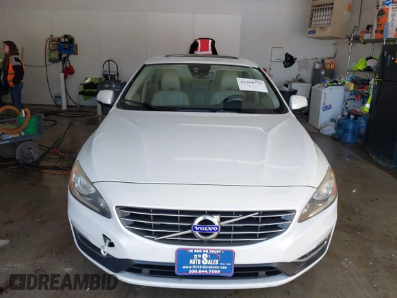2016 Volvo S60 T5 Drive-E Premier with VIN YV126MFKXG2410966, listed as a IAAI auction lot 41308772 with 262,816 mi miles. Bid and sale history available at carsss.com. Image 13.