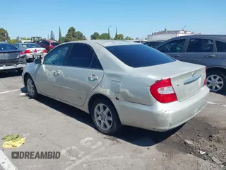 2004 Toyota Camry LE with VIN 4T1BE32K84U341747, listed as a IAAI auction lot 42701813 with 245,431 mi miles and . Bid and sale history available at DreamBid. Image 3.