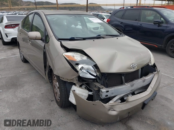 2004 Toyota Prius with VIN JTDKB20U240052320, listed as a IAAI auction lot 42023219 with 177,884 mi miles. Bid and sale history available at carsss.com. Image 6.