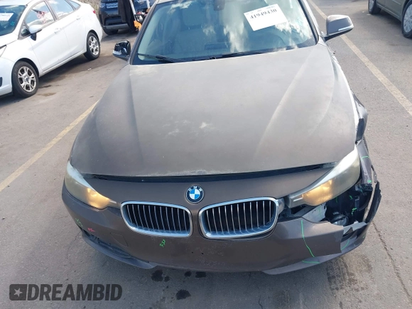 2014 BMW 3 Series 320i xDrive with VIN WBA3C3C58EF983816, listed as a IAAI auction lot 41949430 with 111,627 mi miles. Bid and sale history available at carsss.com. Image 12.