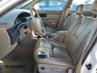 1998 Buick Regal GS with VIN 2G4WF5218W1553273, listed as a Copart auction lot 87310464 with 141,356 mi miles and Salvage Title. Bid and sale history available at carsss.com. Image 7.