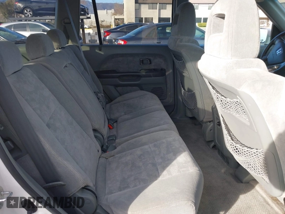 2005 Honda Pilot EX with VIN 5FNYF18475B060655, listed as a IAAI auction lot 41381619 with 142,680 mi miles and . Bid and sale history available at DreamBid. Image 8.