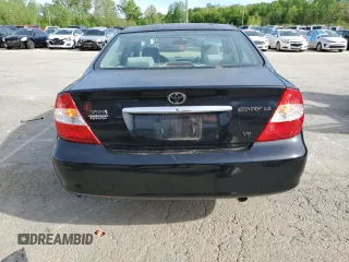 2002 Toyota Camry XLE z VIN 4T1BF32K02U034535, wystawiony jako Copart lot #53894995 z przebiegiem 253 037 mil mil oraz Szkoda całkowita • Salvage title. Historia ofert i sprzedaży dostępna na DreamBid. Obrazek 6.