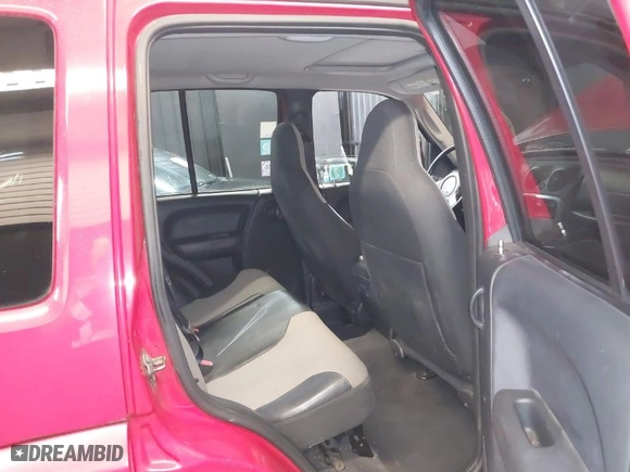 2004 Jeep Liberty Sport with VIN 1J4GL48K84W206909, listed as a IAAI auction lot 41465892 with 144,721 mi miles. Bid and sale history available at carsss.com. Image 8.