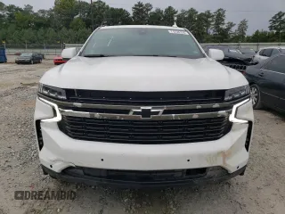 2021 Chevrolet Suburban LS with VIN 1GNSCBKD5MR392512, listed as a Copart auction lot 71238124 with 77,775 mi miles and Salvage Title. Bid and sale history available at DreamBid. Image 5.