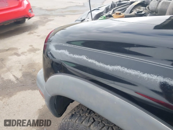 2003 Chevrolet Tracker ZR2 with VIN 2CNBJ734536931923, listed as a IAAI auction lot 41641054 with 111,247 mi miles and . Bid and sale history available at DreamBid. Image 12.